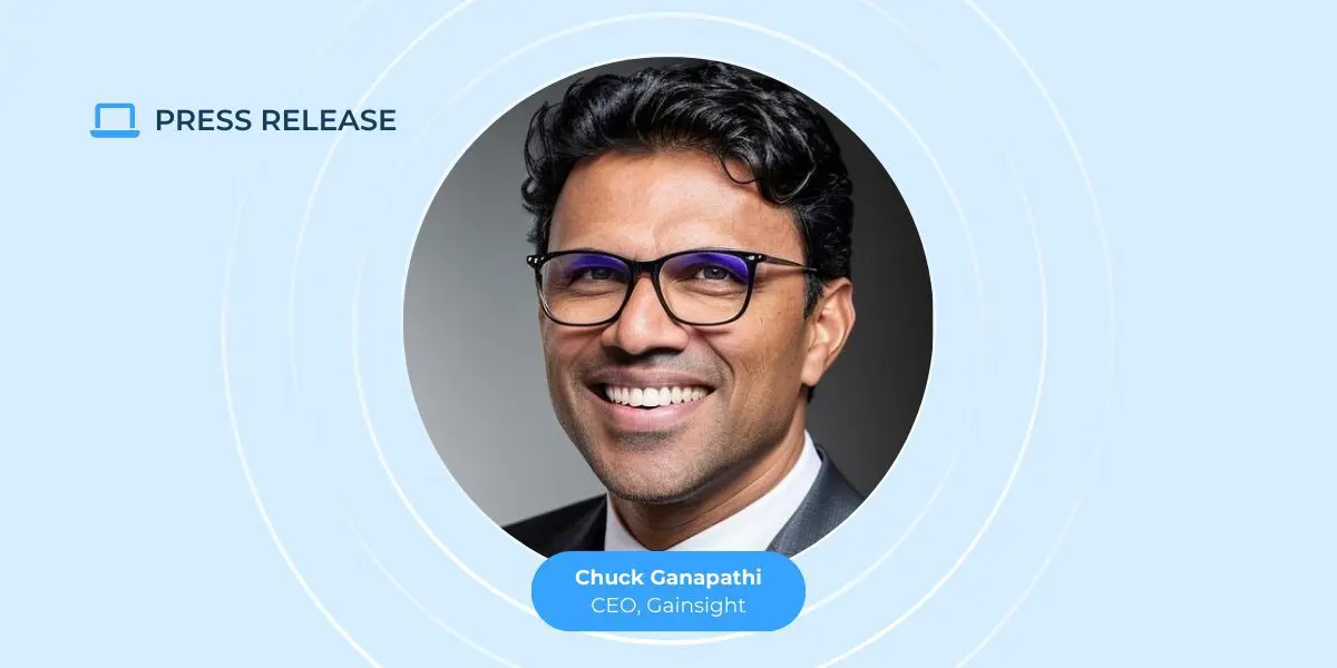 A smiling man with dark hair and glasses is shown in a circular frame. Text on the image reads: "PRESS RELEASE" and "Chuck Ganapathi, CEO, Gainsight," highlighting SaaS customer retention on a blue background.