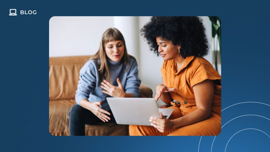 Two women sit on a couch looking at a laptop together, engaged in discussion about Customer Success. One wears a blue top and jeans, the other an orange outfit. The image features a blue border with “BLOG” and a computer icon in the top left corner.