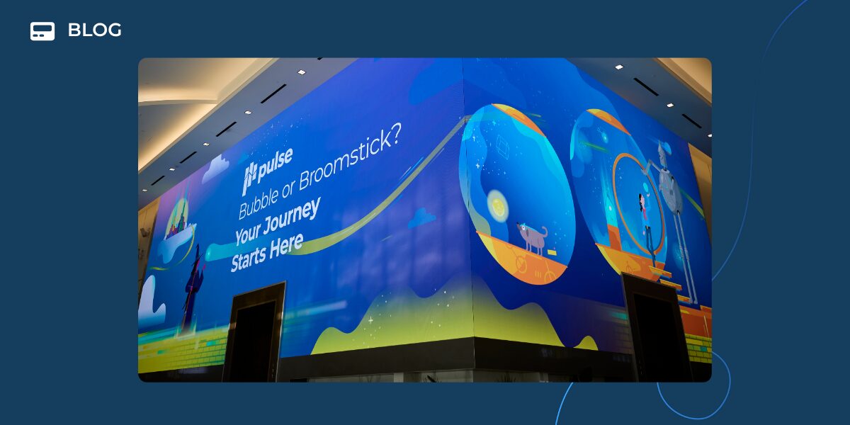 A large, colorful digital wall display shows the text "Hi/pulse Bubble or Broomstick? Your Journey Starts Here" with futuristic illustrations in a modern indoor space, inviting you to begin your end-to-end customer journey at Pulse Europe 2025.