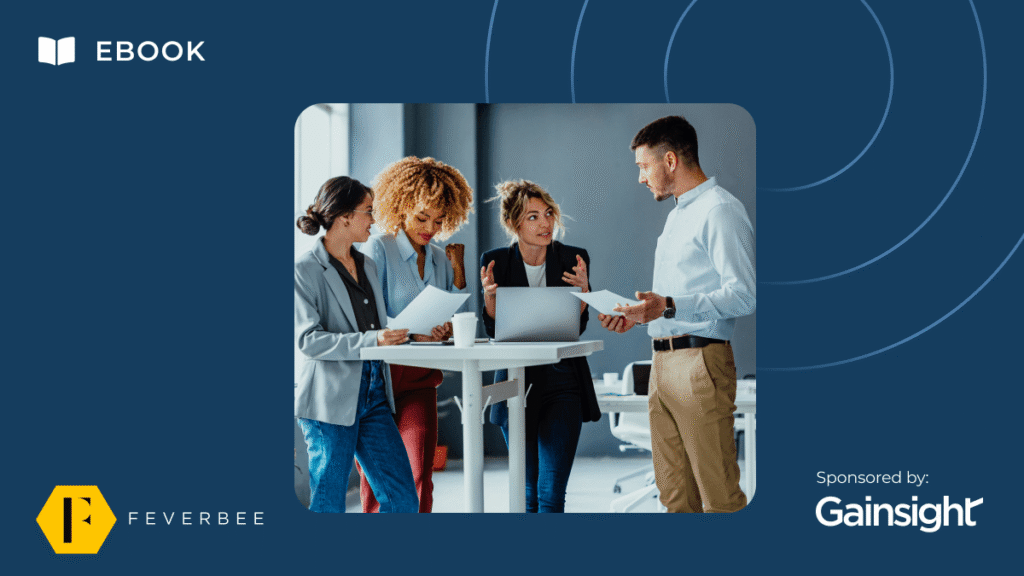 Four colleagues stand around a table in an office, discussing documents and a laptop. The image features the text: "Ebook," "Community Migration Guide," "FeverBee," and "Sponsored by Gainsight" on a blue background with circular designs.