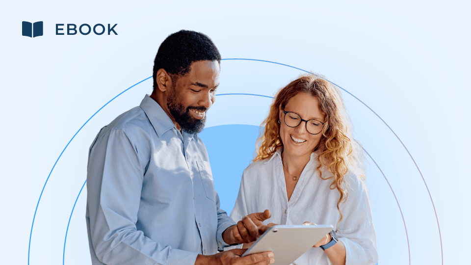 Two people smiling while looking at a tablet together, perhaps exploring new expansion strategies or ways to boost customer retention. The background is light blue with circular designs, and the word “EBOOK” with a book icon appears in the top left corner.