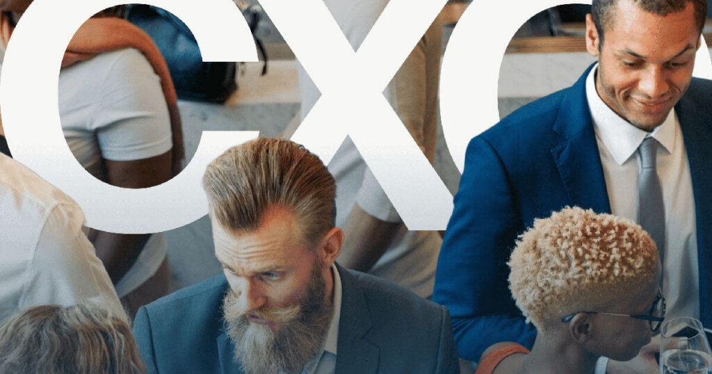 Professionals in business attire networking at an event with the letters “CXC” overlaid in the background.