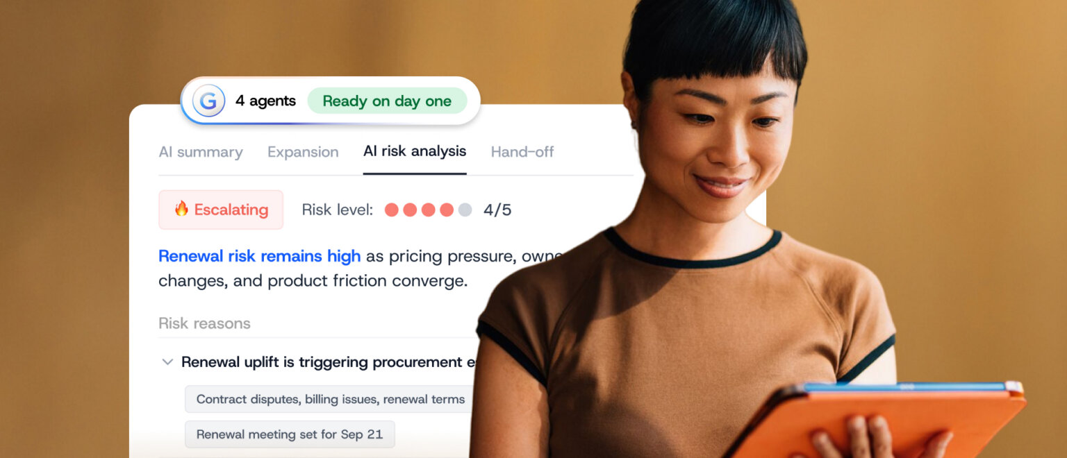 A person looking at a tablet displaying an AI risk analysis dashboard with a risk level of 4/5 and notes on renewal risk factors.